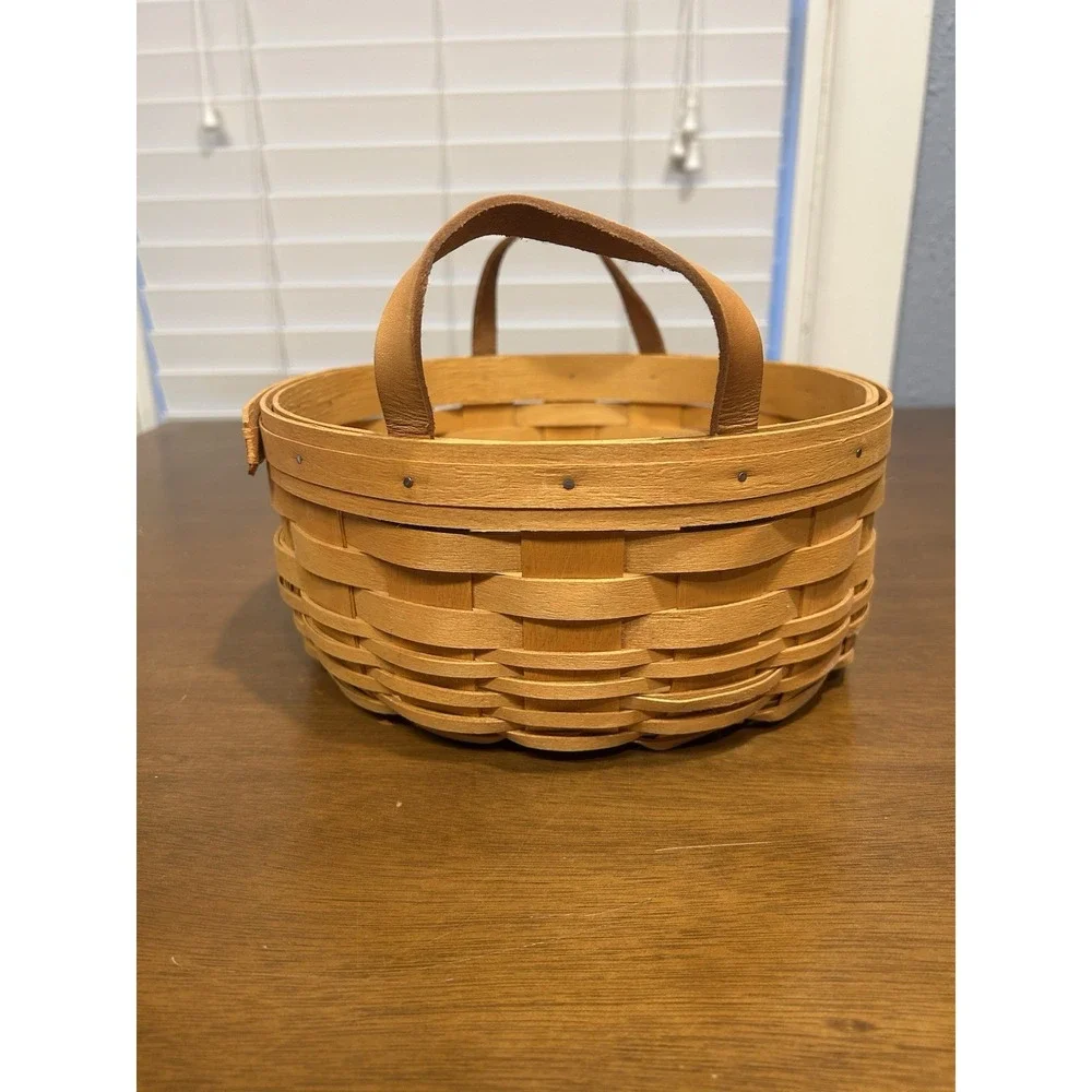 Vintage 1998 Med round Longaberger basket w/ leather handles 9.5